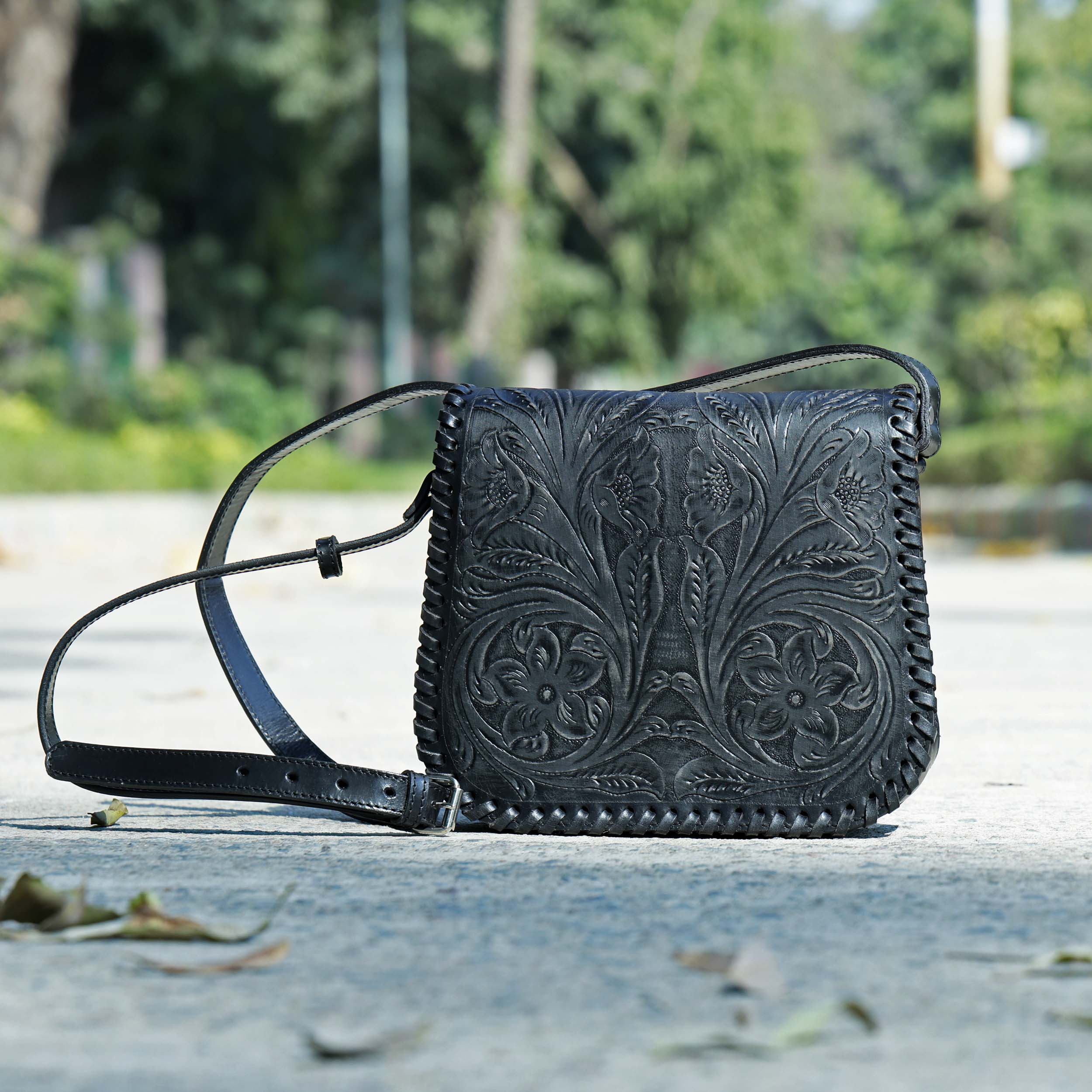 Handcrafted Black Embossed Leather Sling Bag with Magnetic Closure & Adjustable Strap - Image 2
